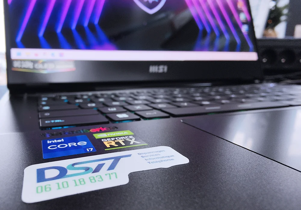 Photographie d'un ordinateur portable qui fonctionne très bien depuis l'intervention de DSIT.